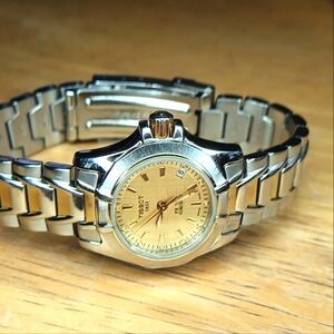 X Vintage Tissot quartz PR100. Superior Swiss quality 3 hand / date, two